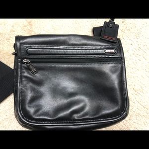 Tumi  messenger bag almost brand new.